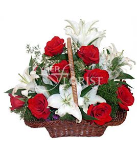 roses and lilies in a basket
